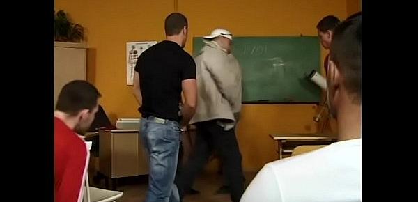  Horny teacher shows striptease on the table and gives a blowjob to all students in the class